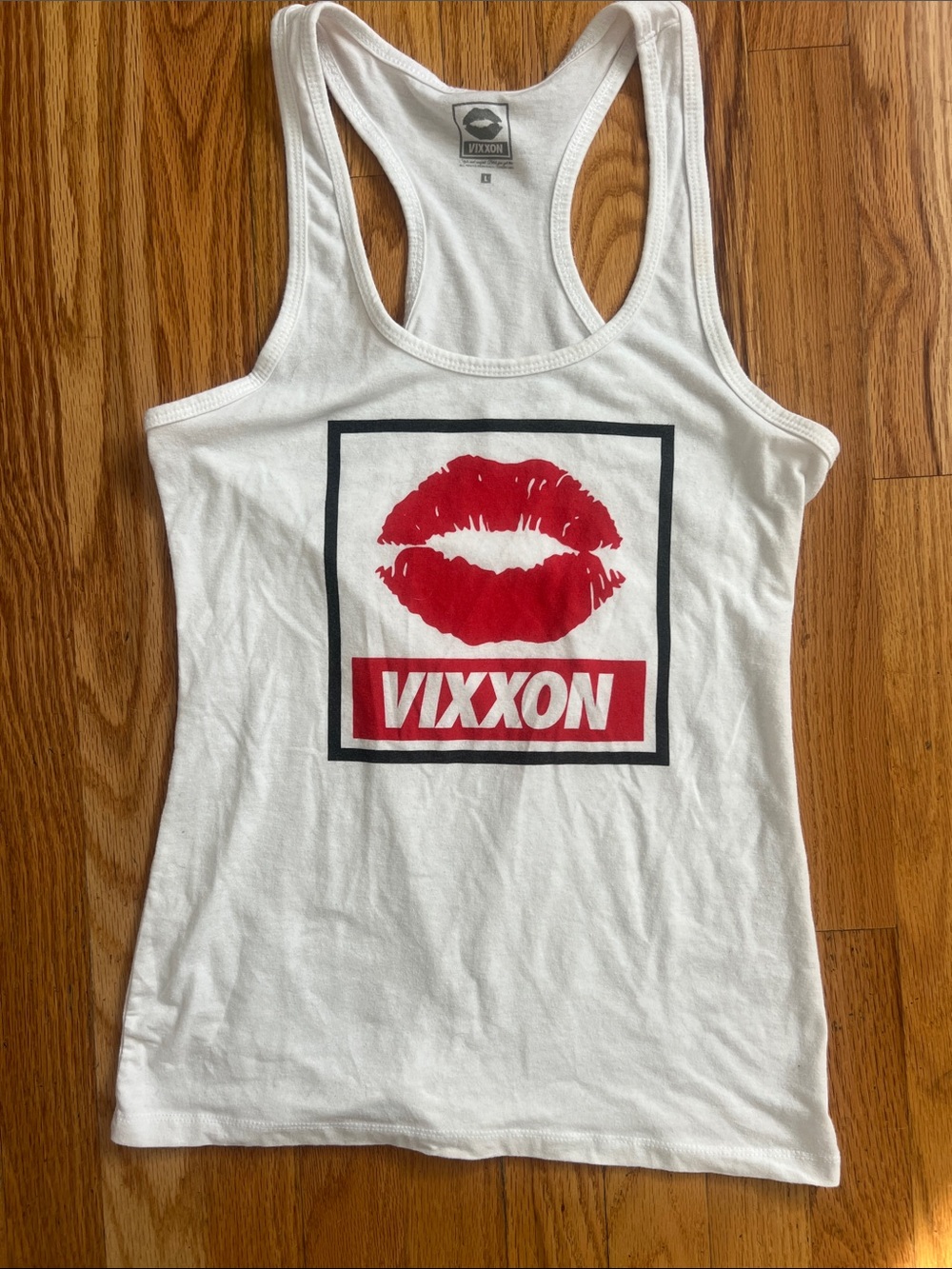 Vixxon white razorback tank. Size large